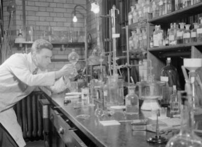 Penicillin Past, Present and Future- the Development and Production of Penicillin, England, 1944 Dr Wilson Baker hard at work in the Dyson-Perrins' laboratory, Oxford. Dr Baker has been working with Professor Sir Robert Robinson and others to try to create synthetic penicillin. He has just succeeded in breaking down penicillin into its separate elements and it is now a question of discovering the correct way to put these together to create a synthetic copy of the natural mould. Imperial War Museum